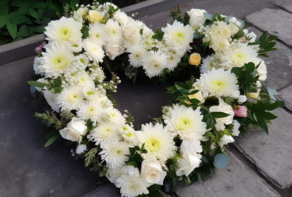 Que condolencias o frases poner en coronas y cintas funerarias